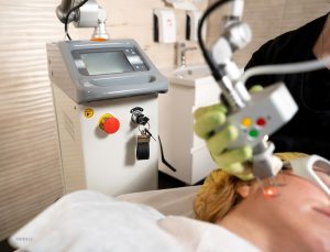 A patient receiving laser skin resurfacing treatment.